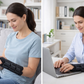 Adjustable black carpal tunnel wrist brace with three hook-and-loop straps for wrist support and stabilization. 3
