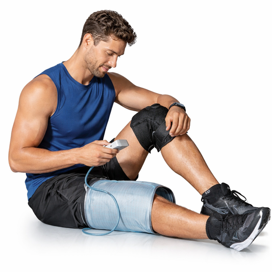 Dr. Franklyn's portable leg compression machine with grey wrap and digital controller for circulation and recovery. 1