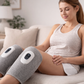 Pair of gray cordless air compression leg massagers with built-in LCD control panels for calf muscle recovery and circulation. 1
