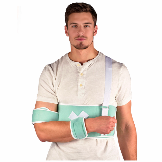 Shoulder cold compression therapy brace with arm sling for pain relief and injury support.